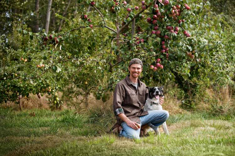 Sustainable Connections_Food And Farm Program_Apples Man Kneeling Dog_People_Pets